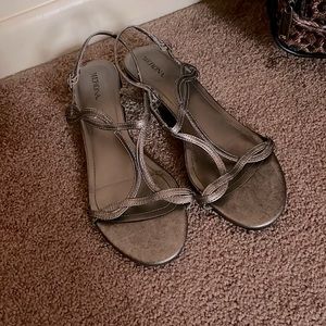 Silver sandals with slightly elevated heel